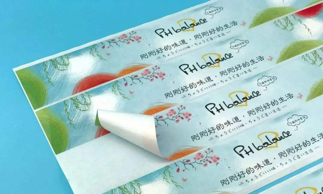 卷筒不干膠標(biāo)簽印刷覆膜不牢，雜質(zhì)、卷曲問(wèn)題的解決方法